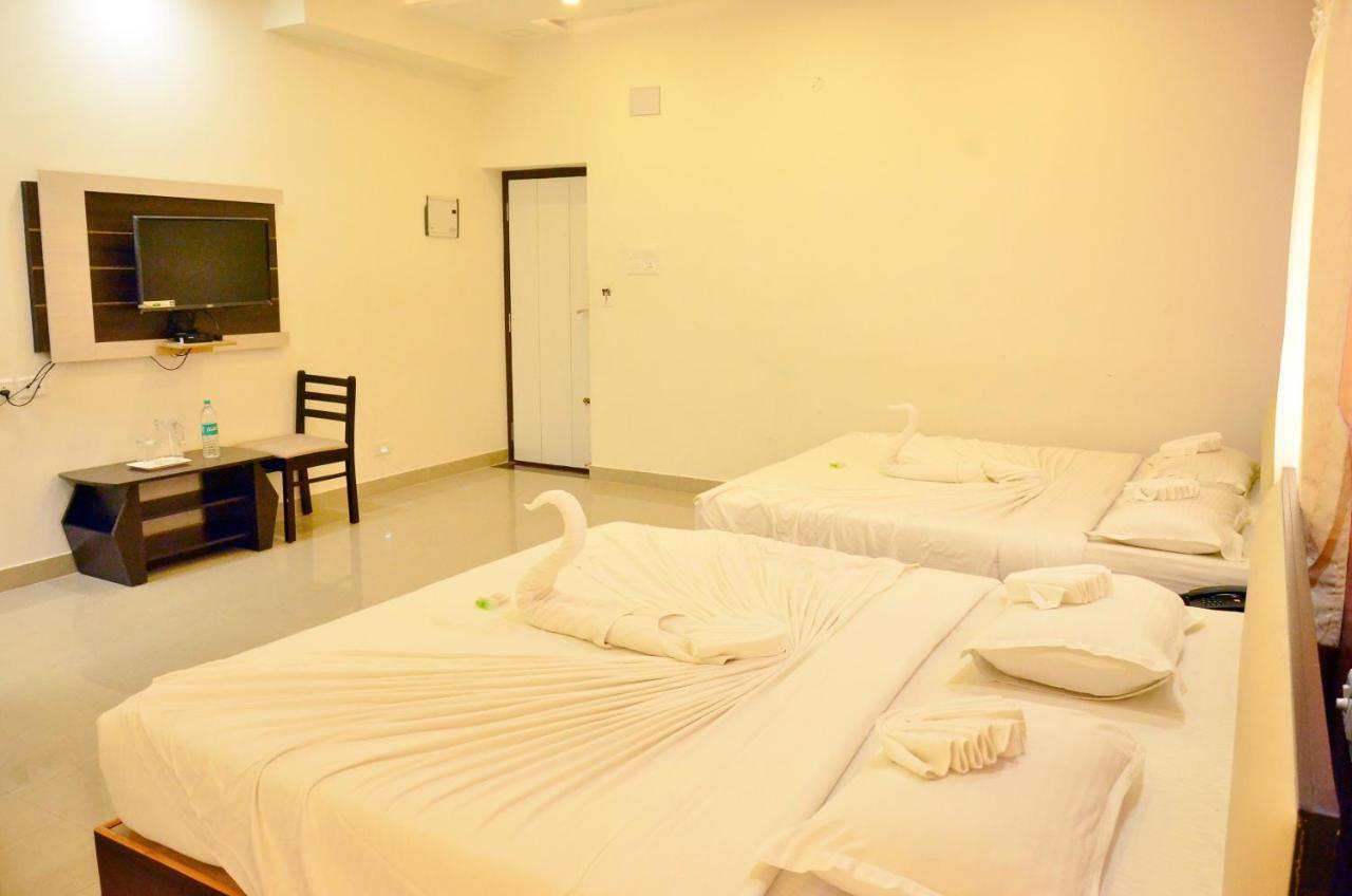 Hotel Ambai Grand Ambāsamudram Esterno foto